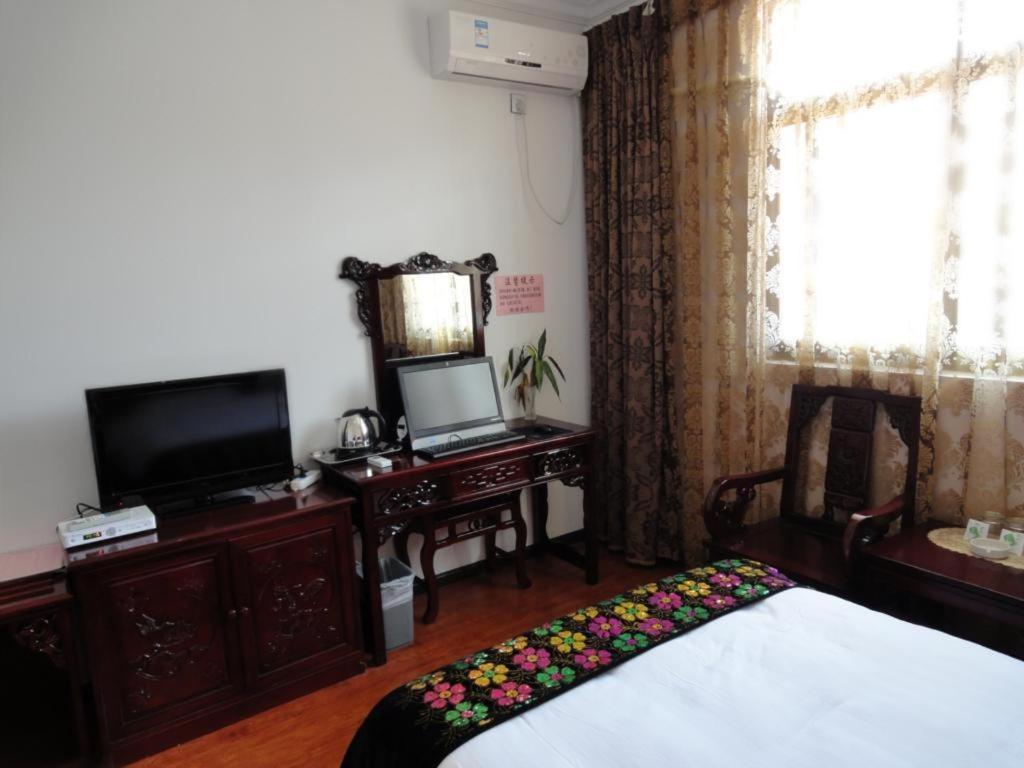 Dali Four Season Flower Inn Дали Номер фото